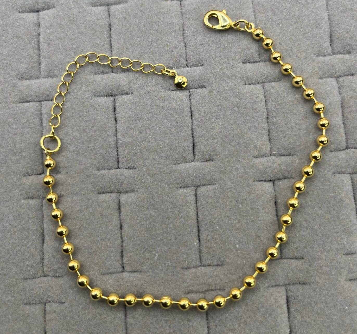 Pulseira Dourada de Esferas